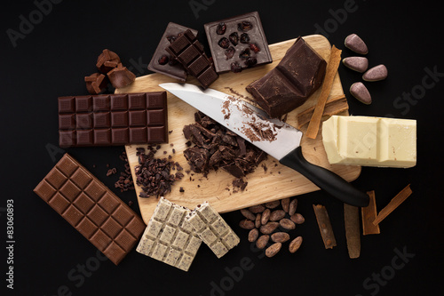 Chocolate handmade candies on a kitchen table photo