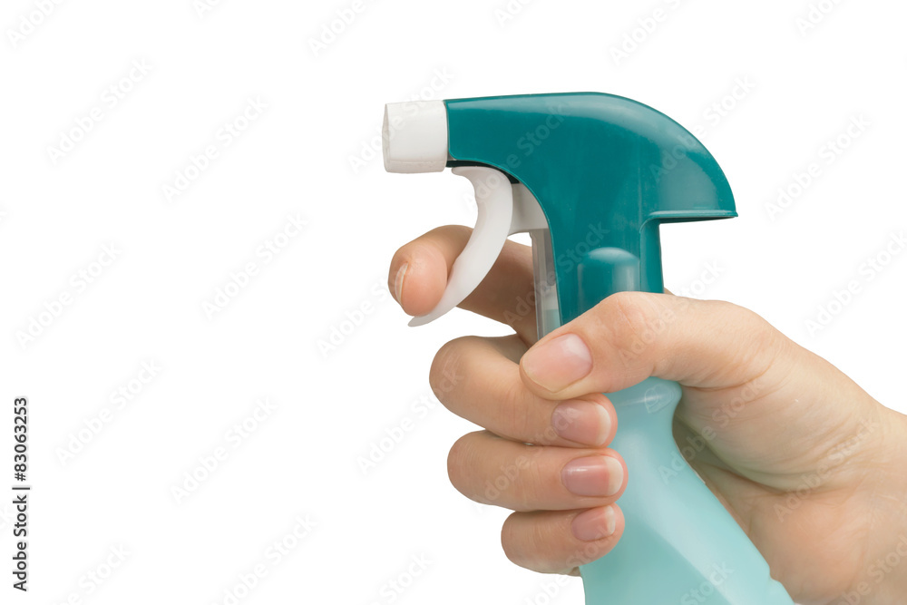 Female hand is holding a cleaning detergent isolated. Female hand is holding a cleaning detergent isolated.