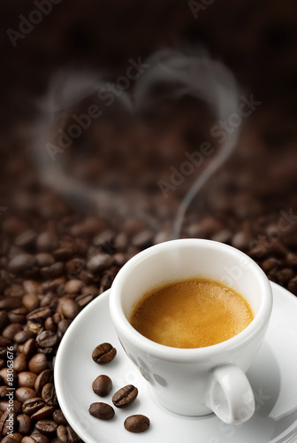 coffee cup on coffee beans