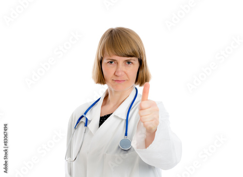  female doctor in lab coat with thumb up