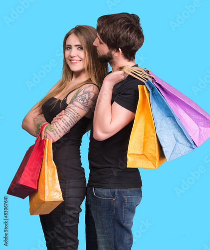 Happy couple with shopping bags