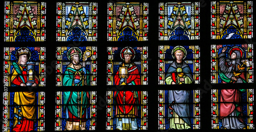 Stained glass window depicting Catholic Saints photo