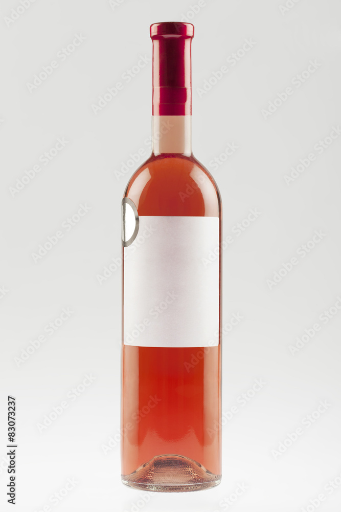 Red wine bottle with empty label and sticker Red wine bottle with empty label and sticker