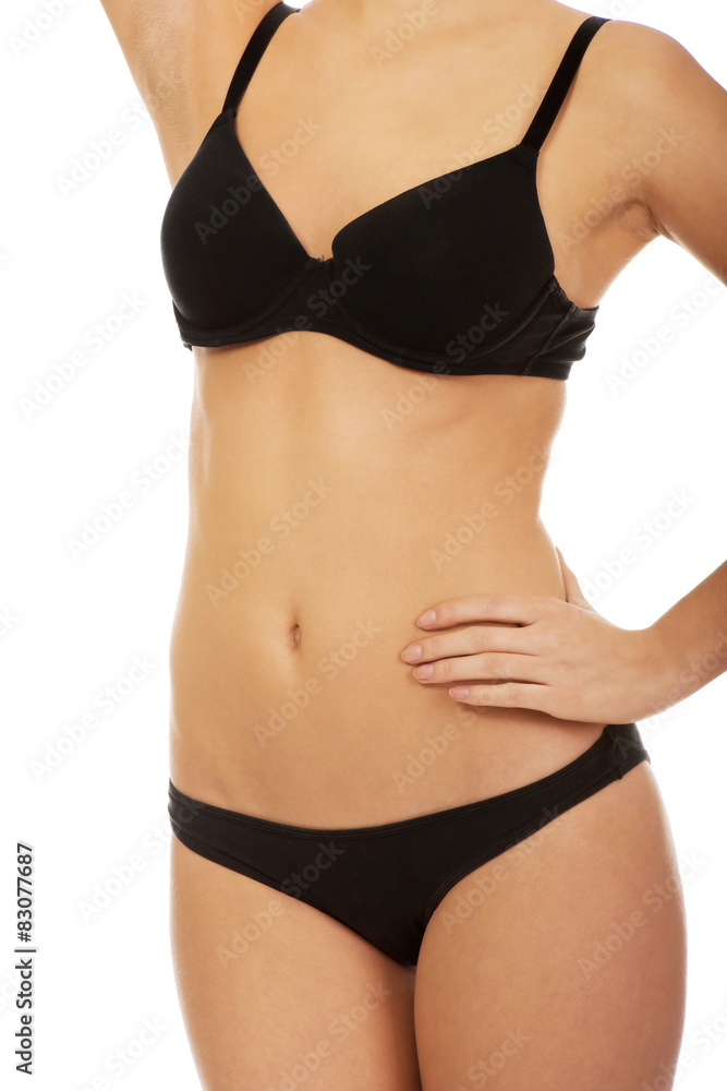 Woman standing in bikini.