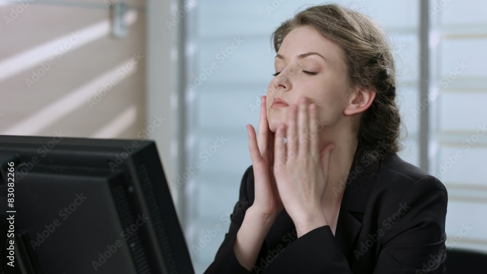 Tired manager working at a computer. Headache. Tired manager working at a computer. Headache.