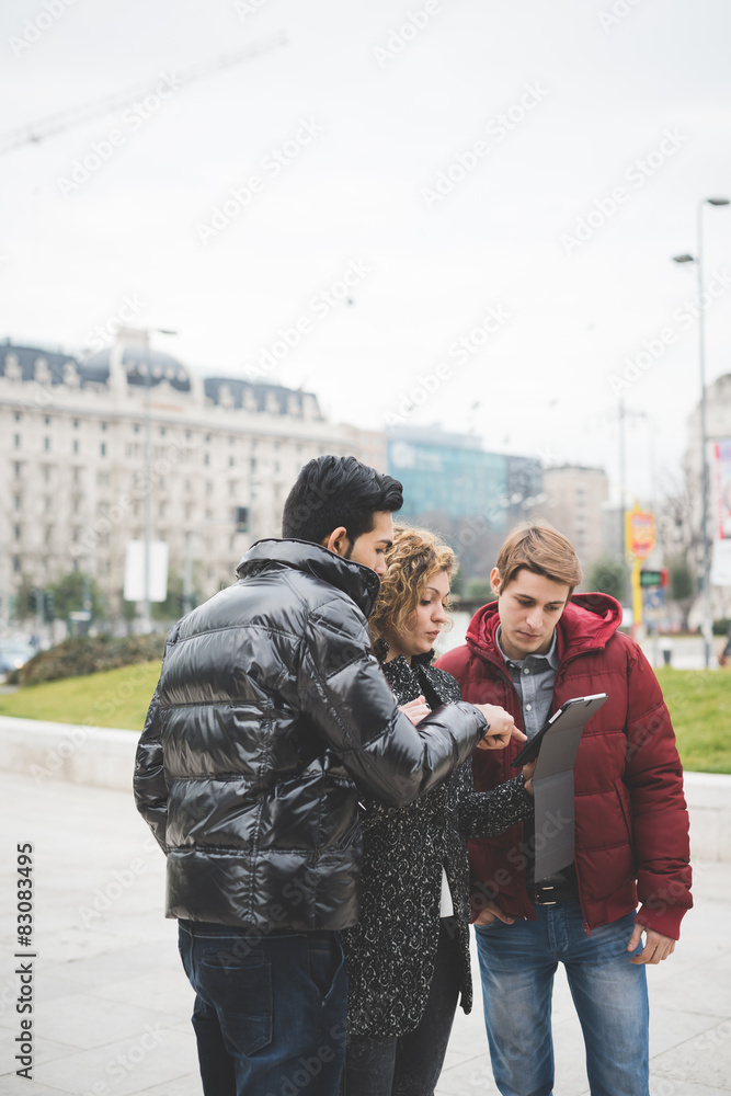 Multiracial business people working outdoor in town Multiracial business people working outdoor in town