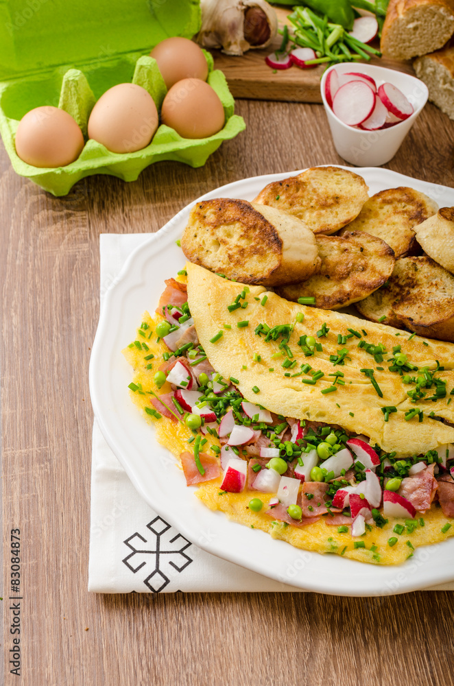 Omelette with spring vegetables and bacon Omelette with spring vegetables and bacon