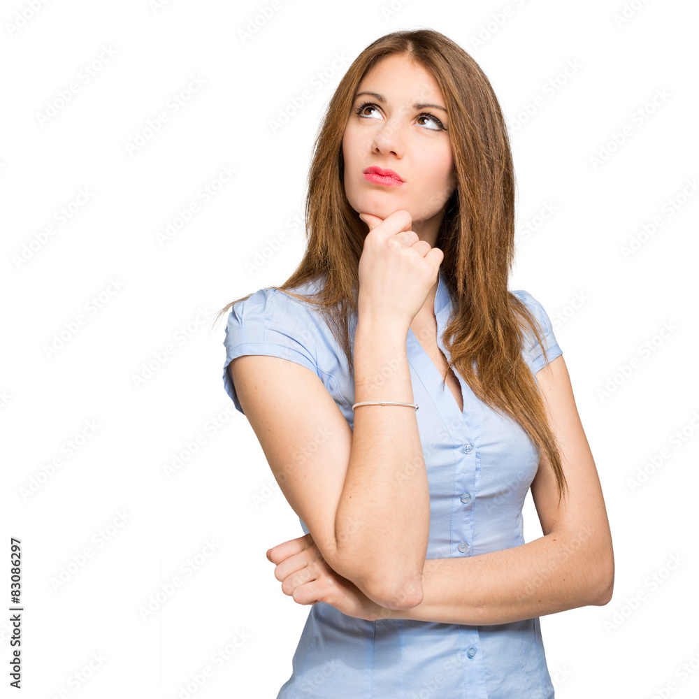     Beautiful young woman in a pensive expression 