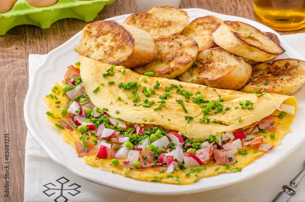 Omelette with spring vegetables and bacon Omelette with spring vegetables and bacon