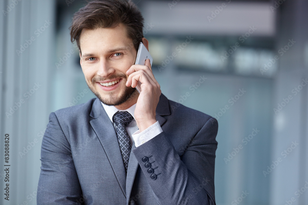Handsome businessman on the phone Handsome businessman on the phone