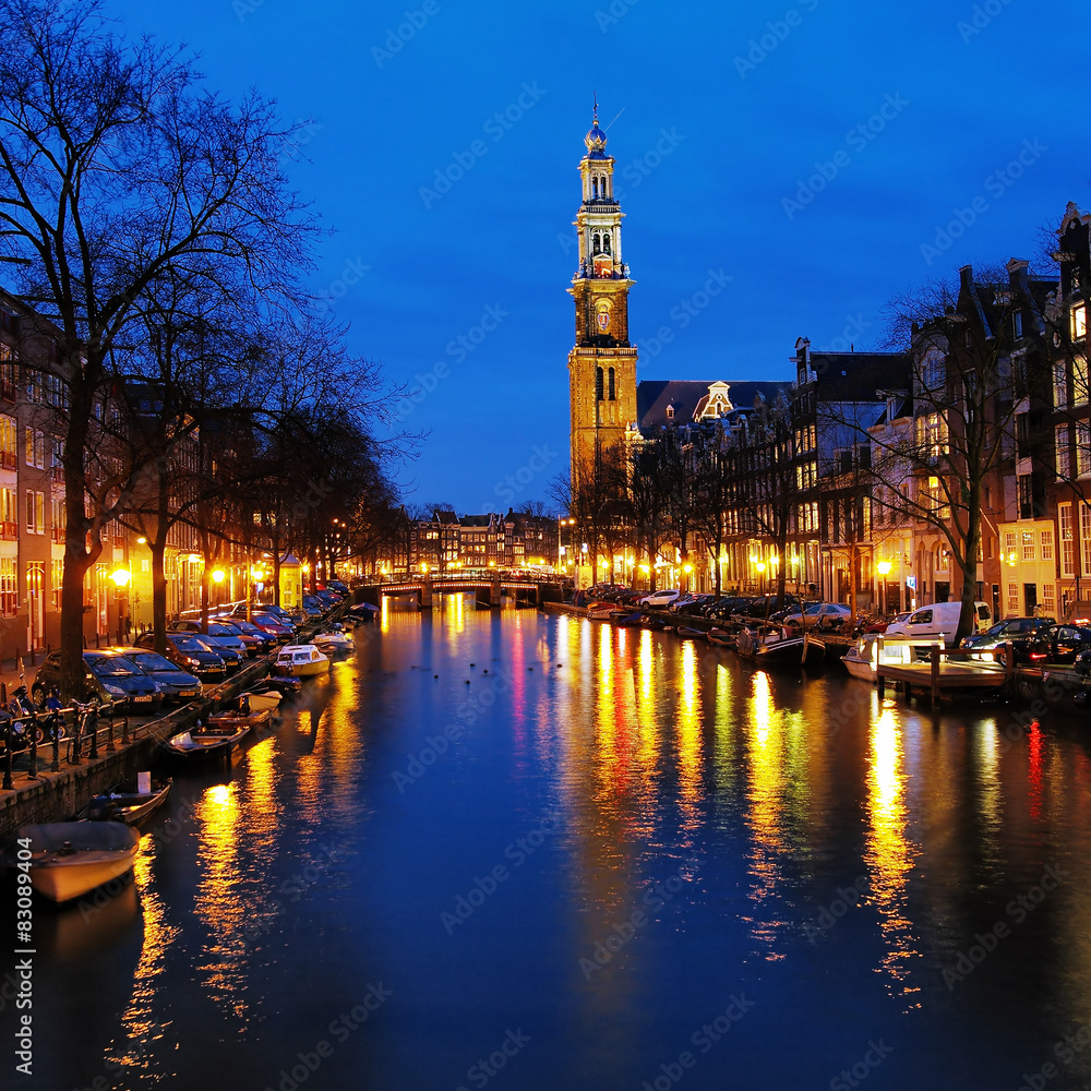 Evening view on the Western church in Amsterdam, Netherlands