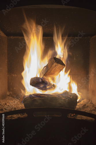 Iron wood stove burning