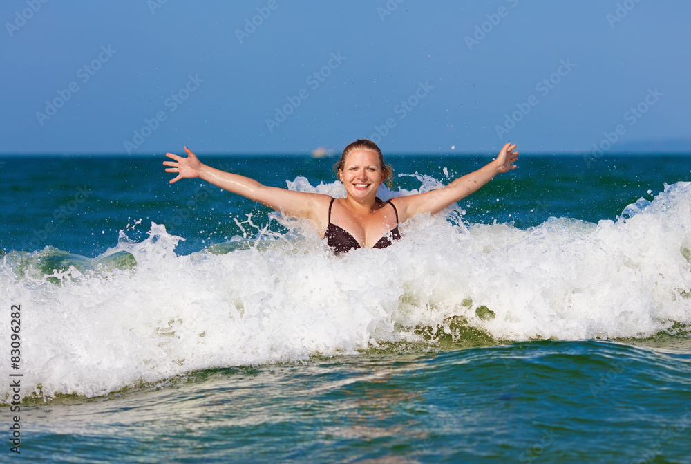 Woman in wave Woman in wave