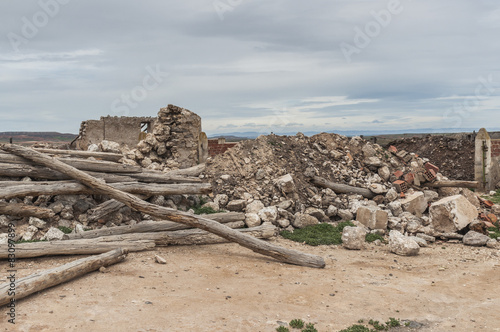 Ruins of an old stone house in rural setting