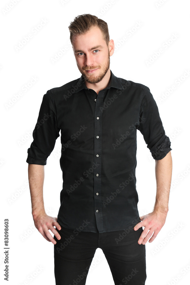 An attractive man standing in a studio An attractive man standing in a studio