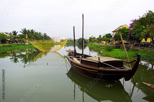 Fishing net on Hoai river, Hoi An, Quang Nam, Vietnam photo