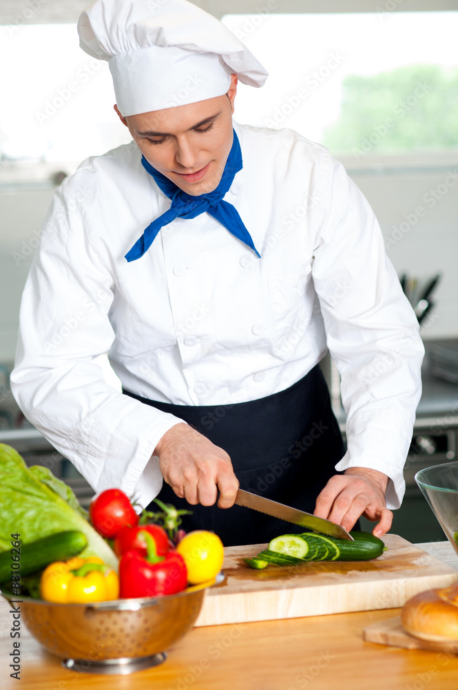 Chef chopping vegetables