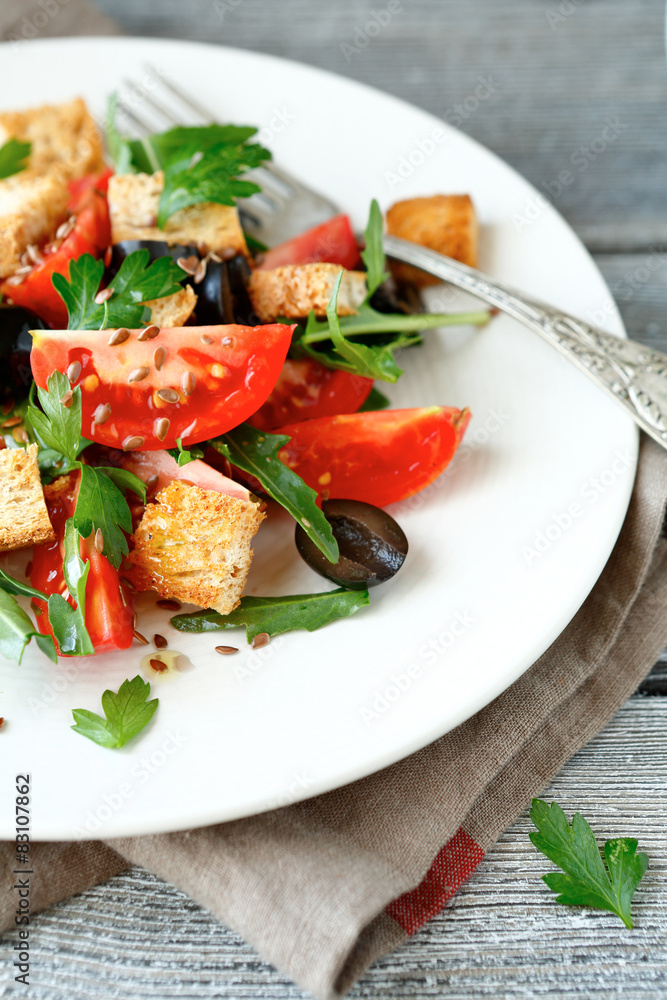 Summer salad with tomatoes and arugula Summer salad with tomatoes and arugula