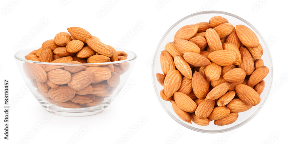 Dried almonds in a bowl on white background, side and top view