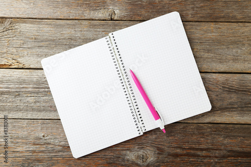 Notebook on grey wooden background