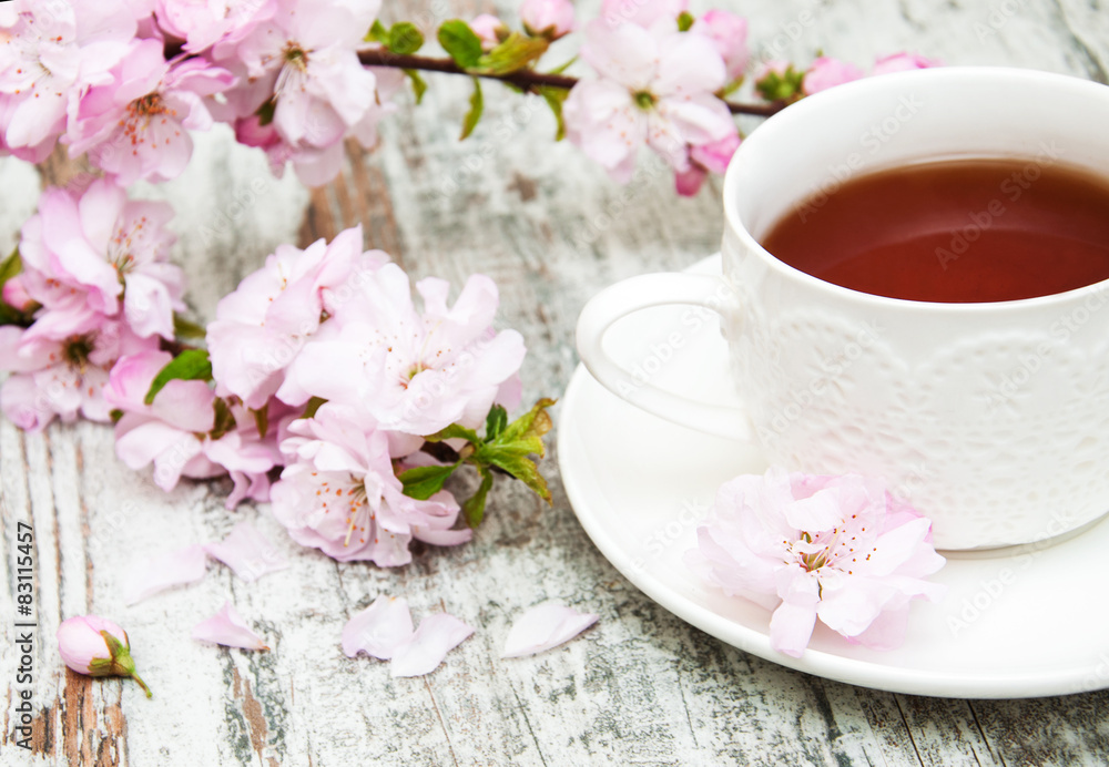 Cup of tea and sakura blossom Cup of tea and sakura blossom