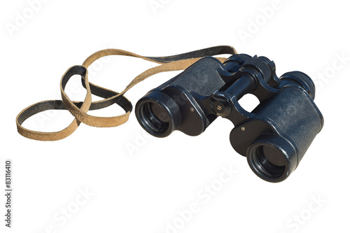 Vintage binoculars on the background of cut