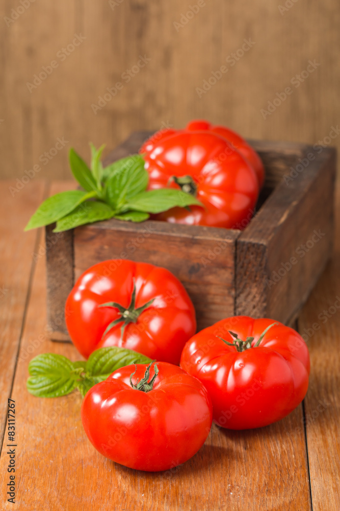 Tomatoes in wooden box Tomatoes in wooden box