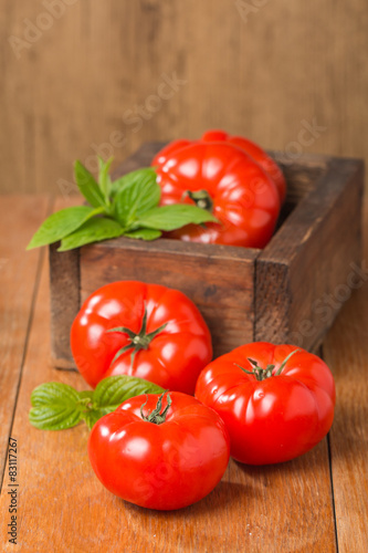 Tomatoes in wooden  box