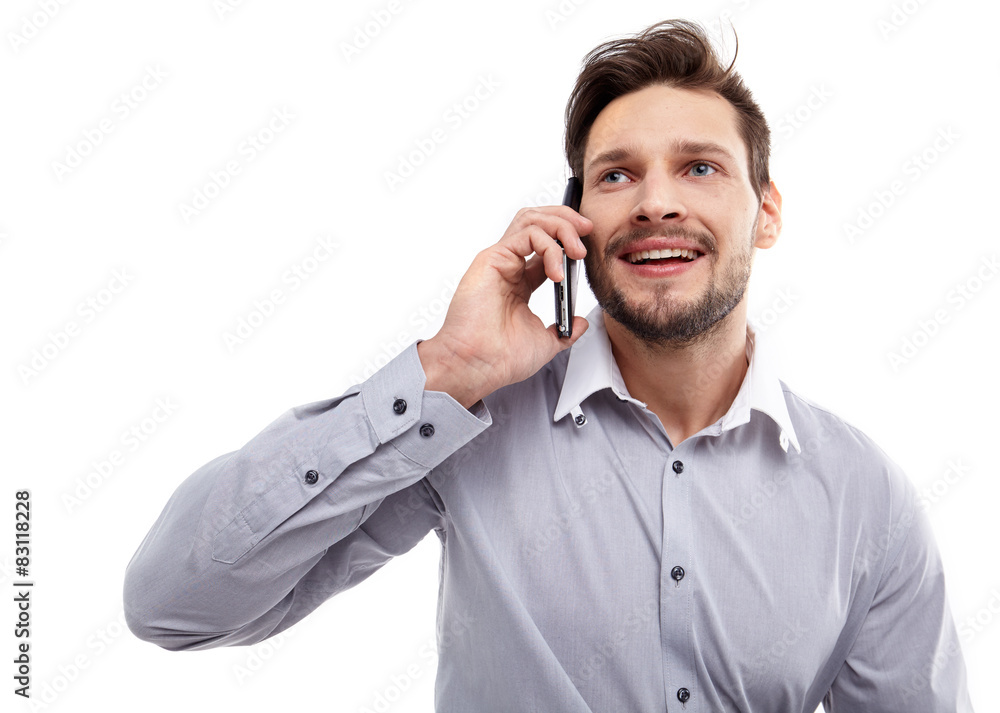 Happy Young Man Using Mobile Phone Isolated On White Background Happy Young Man Using Mobile Phone Isolated On White Background
