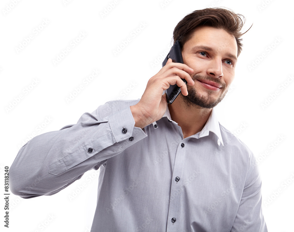 Happy Young Man Using Mobile Phone Isolated On White Background Happy Young Man Using Mobile Phone Isolated On White Background