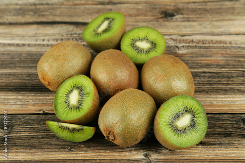 Kiwi fruit on brown wooden background