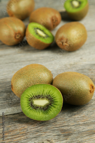 Kiwi fruit on grey wooden background