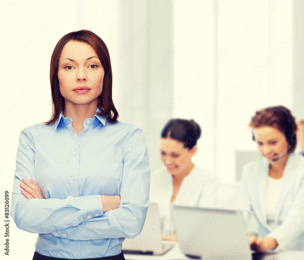 smiling businesswoman with crossed arms at office smiling businesswoman with crossed arms at office