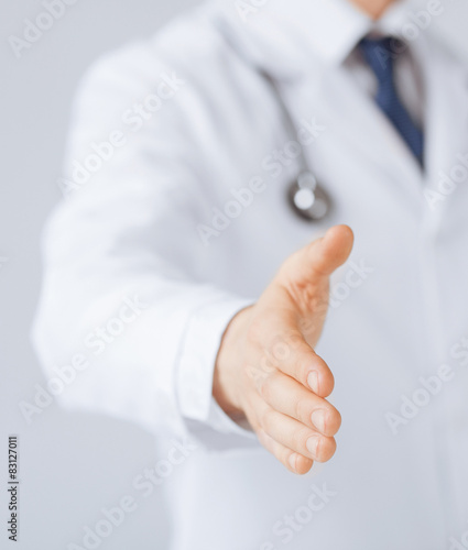 male doctor with open hand ready for hugging