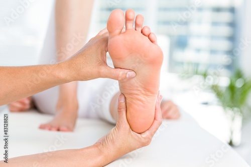 Physiotherapist massaging her patients foot © WavebreakMediaMicro