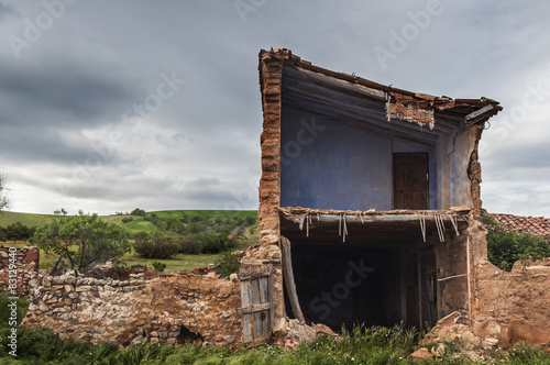 Ruins of an old stone house in rural setting