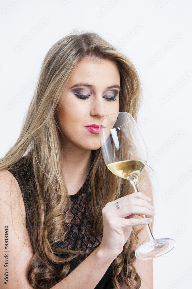 portrait of young woman with a glass of white wine portrait of young woman with a glass of white wine