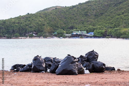 garbage(Black bag) on the beach