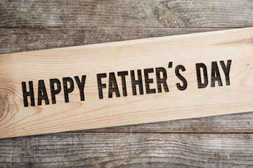 Fathers day composition. Studio shot on wooden desk background.