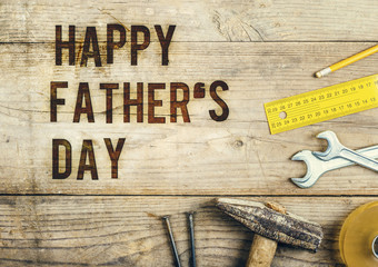 Fathers day composition. Studio shot on wooden desk background.