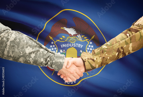 Military handshake and US state flag - Utah photo