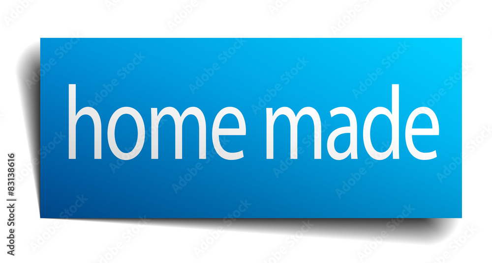 home made blue paper sign on white background home made blue paper sign on white background
