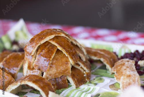 Baked chimney cakes.Blurred background photo