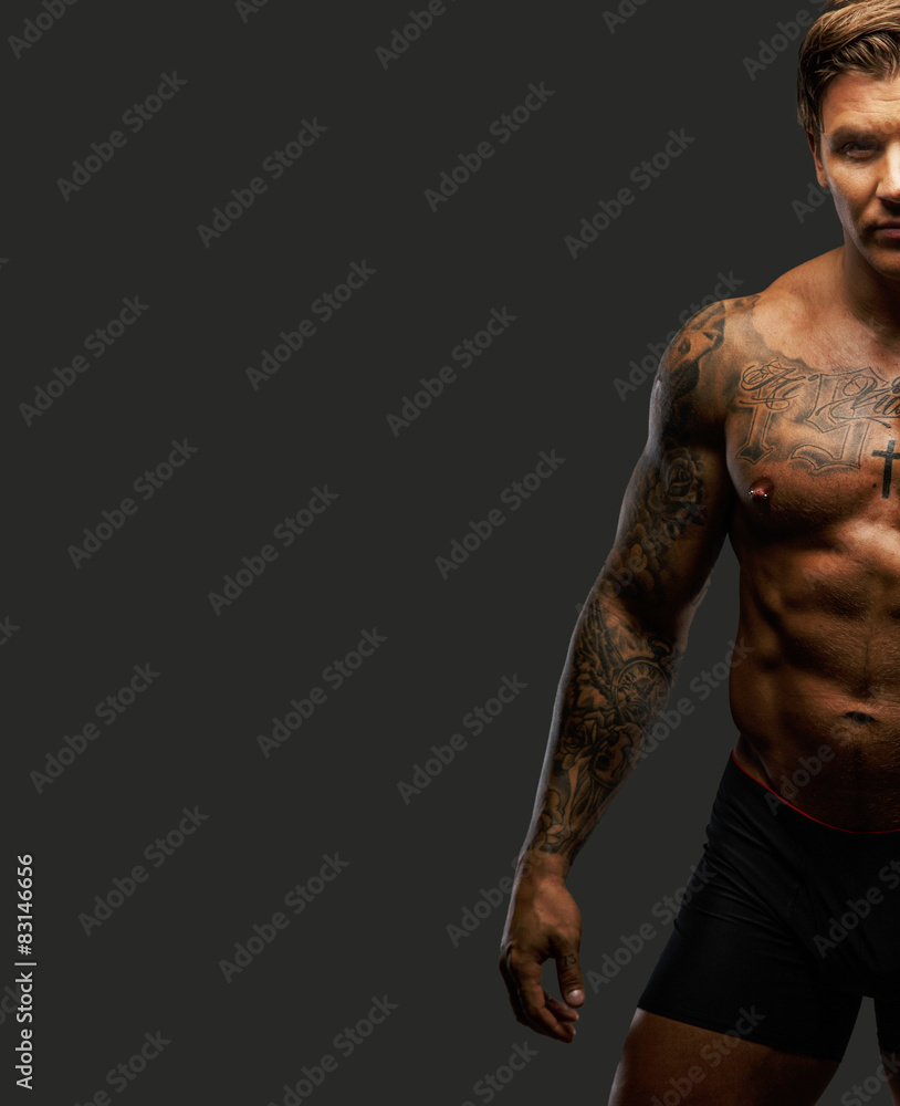 Fototapeta premium Half of muscular guy
