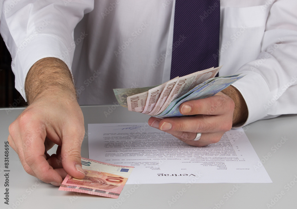 Geld auszahlen StockFoto Adobe Stock