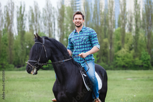 man riding a horse