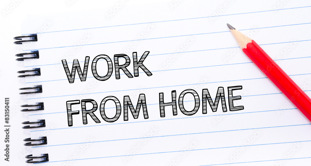 WORK FROM HOME Text written on notebook page WORK FROM HOME Text written on notebook page