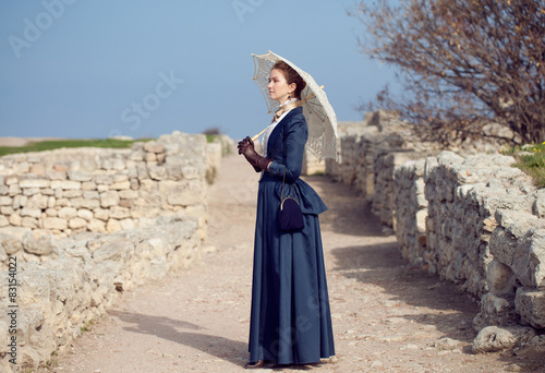 Romantic young beautiful lady outdoors