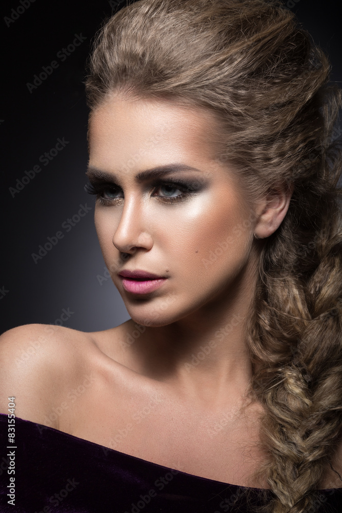girl with bright make-up and hairstyle as a braid. girl with bright make-up and hairstyle as a braid.