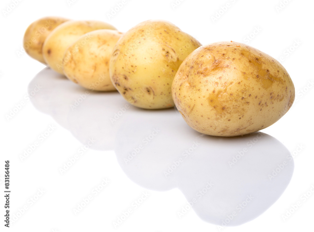 Baby potatoes over white background Baby potatoes over white background